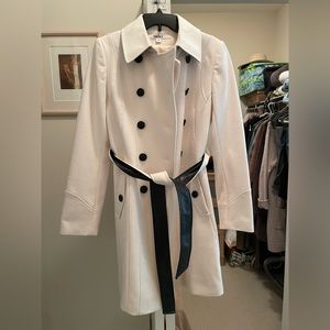 BNWT Size 8 DKNY coat. Never worn.Has been kept in a protective bag.